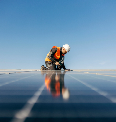 person installing solar panel